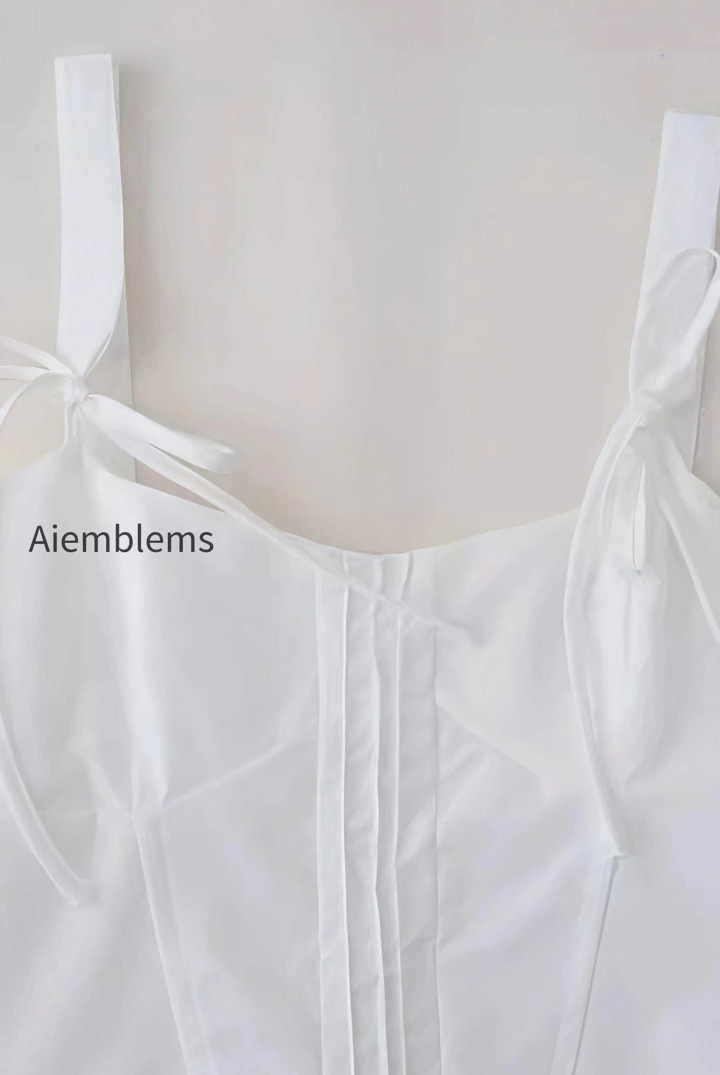 white-bow-slim-fit-cami-top
